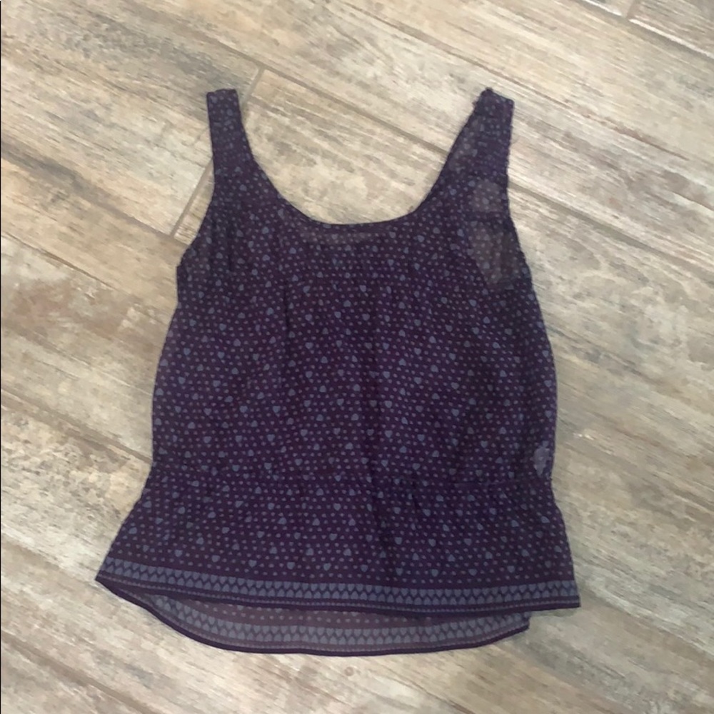 Purple blouse with dots and hearts. Is sheer